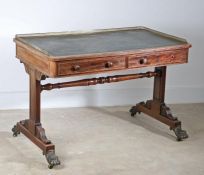 An early 19th century mahogany writing table, in the manner of Gillows, with three-quarter pierced