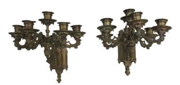 A pair of French Six Arm Ormolu Wall Sconces of Ecclesiastical design, pierced foliate scroll