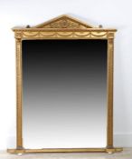 An early 19th century giltwood over-mantel mirror of architectural form, arched pediment,