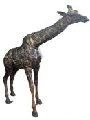 A large and impressive cast bronze garden sculpture of a Giraffe, 190cm tall,  220cm width from