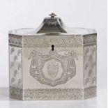 A George III silver tea caddy, London 1789, maker Henry Chawner, of octagonal form, the domed hinged