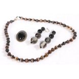 Suite of banded agate jewellery to include a necklace formed of spherical beads pair of earrings and