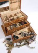 Wooden jewellery box formed as a chest of drawers with contents of various costume jewellery and