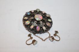 Opal and white metal brooch with floral decoration togwther with a pair of yellow metal and opal