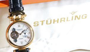 Stuhrling Automatic "Open Heart" gentleman's gilt stainless steel wristwatch, the signed engine
