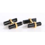 A pair of gilt metal and black onyx cufflinks, with rope design to the gilt metal 20mm wide