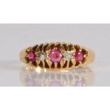 18 carat gold ruby and diamond ring, the head set with three round cut rubies with two