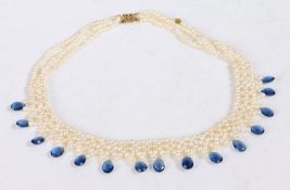 Pearl and Kyanite woven necklace, with three strands of pearls together with pear shape kyanite