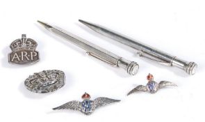 Collection of silver and white metal jewellery to include two silver and enameled RAF badges, silver