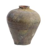 A large terracotta urn, possibly Qing Dynasty, or earlier, Chinese  Of elongated globular form, with