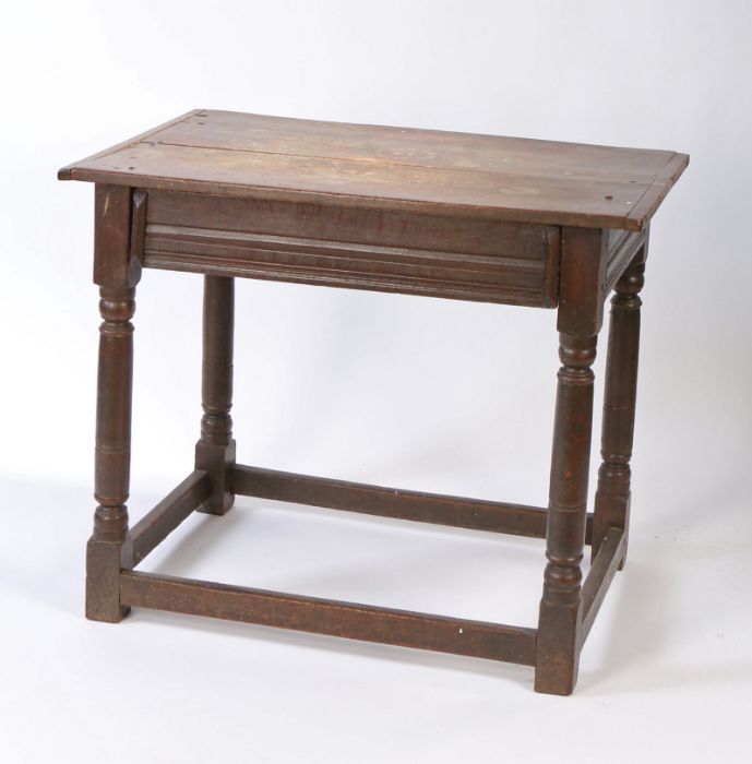 A Charles II oak side table, circa 1680 Having an end-cleated twin-boarded top, a run-moulded drawer - Image 4 of 4