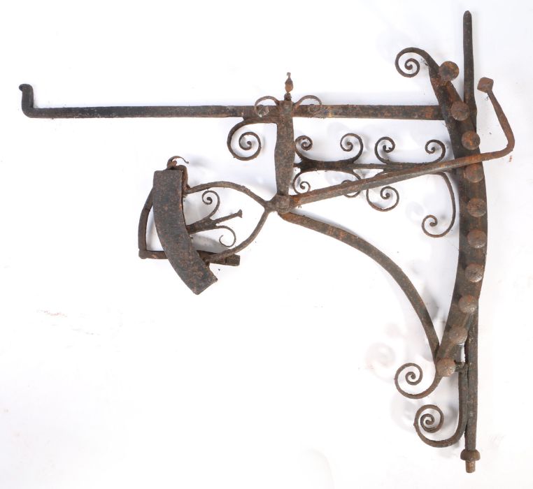 An early 18th century wrought iron chimney crane, English With ten positions, decorative - Image 2 of 2