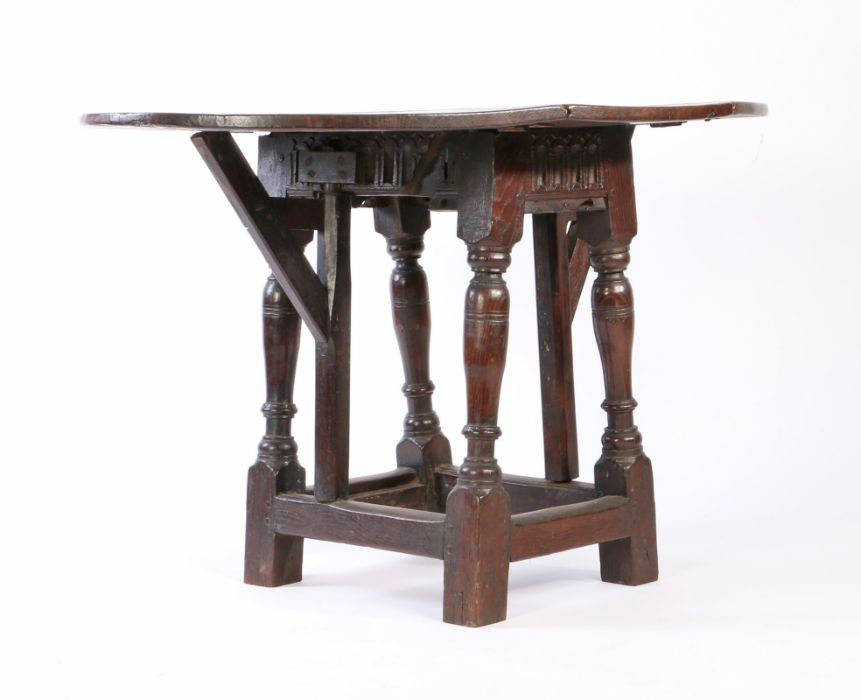 An oak table stool: a rare Elizabeth I oak joint stool, circa 1580, with a 17th century oval drop- - Image 5 of 8