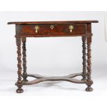 A William & Mary oak side table, circa 1690 Having a triple-boarded and end-cleated top, and