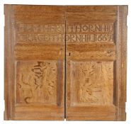 A pair of Charles II oak doors, named and dated 1667 Reputedly box-pew doors, although probably
