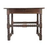 A Charles II oak side table, circa 1670 Having a boarded top with ovolo-moulded edge, and flat run-