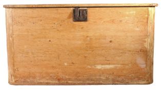 An 18th century boarded pine chest Having an end-cleated top hinged near the rear, and rounded front