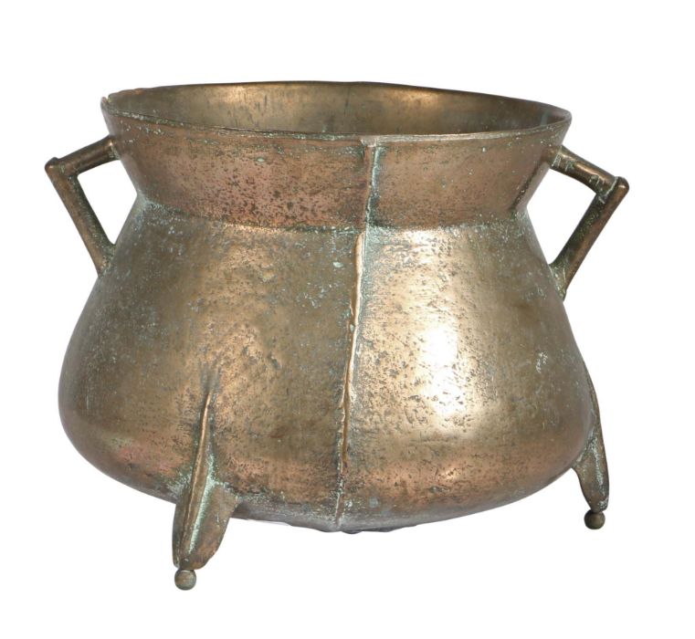 A 17th century bronze cauldron, probably South-West, England Of typical 'bag' form, with angular lug
