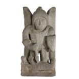 An early 19th Century carved granite figure of The Archangel St. Michael Dressed as a Knight, with