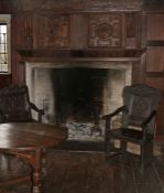 A rare Charles II joined oak 'Durham' panel-back open armchair, circa 1670.  See Lot 81, a court