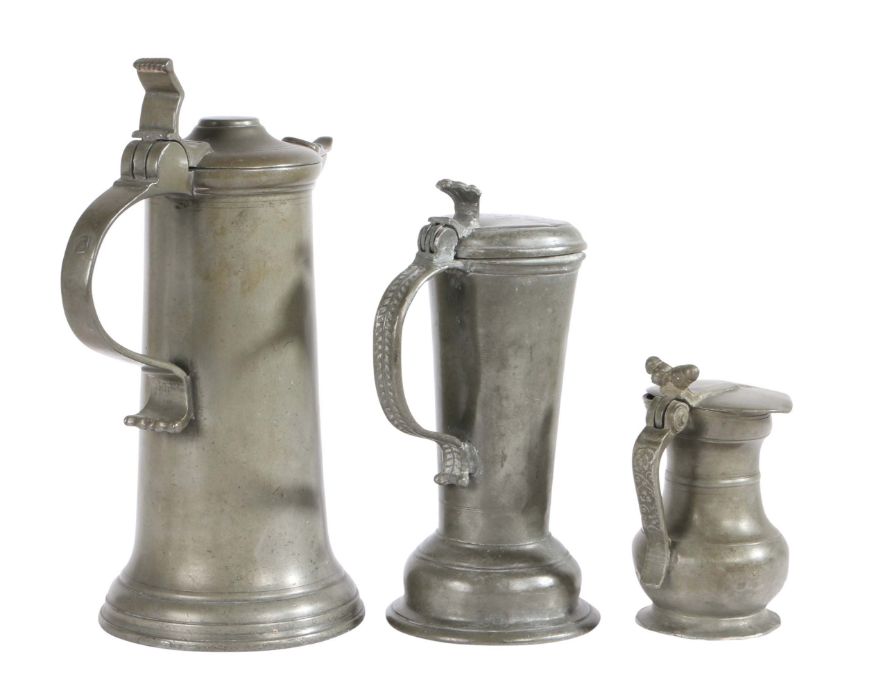 Two 18th century small pewter flagons, German One dated 1783 to lid, height 20.5cm; and an early