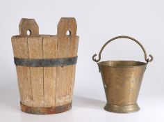 A coopered oak pail The chamfered handles with pierced circular holes above a tapering body with two