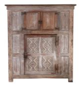 A 16th century style oak livery cupboard, circa 1900 In the the Wardour Street manner, English, with