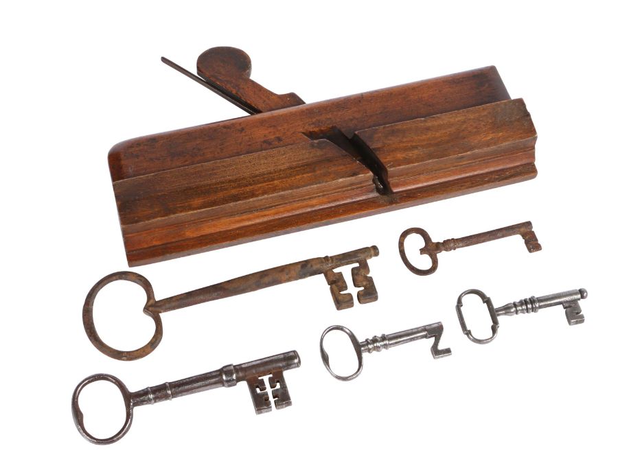 A group of five 18th-19th century steel/iron keys Most with oval bow, together with an early 19th