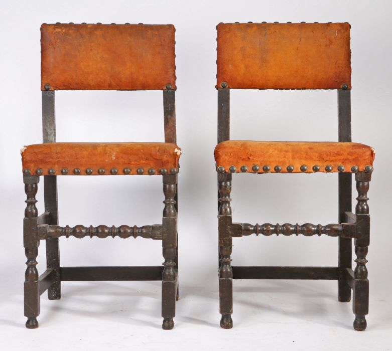 A pair of Charles II oak and hide upholstered chairs, circa 1670 Each with rectangular padded open - Image 2 of 2