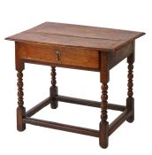 A William and Mary walnut and linear-inlaid side table, circa 1700 The top of two boards, with