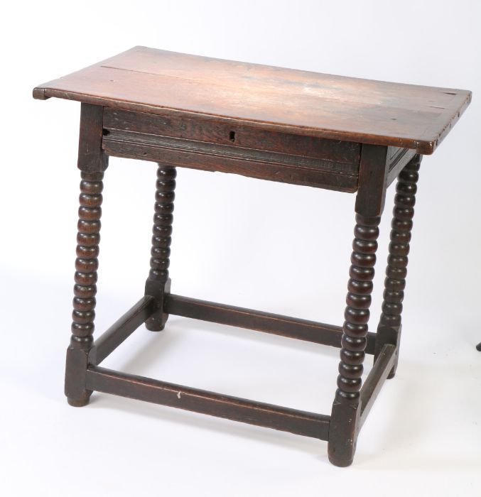 A Charles II oak side table, circa 1680, Having a twin-boarded and end-cleated top, a run-moulded - Image 3 of 3