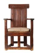 A rare Charles II pine caqueteuse armchair, Scottish, probably Aberdeenshire, dated 1664 The back