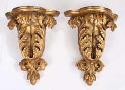 A pair of giltwood wall brackets, in the early 18th century Kentish manner, Each with a shaped bowed