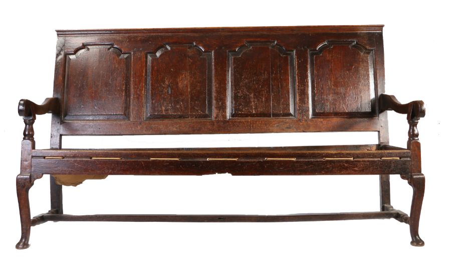 A George II oak settle, circa 1750 Having a rectangular back of for flattened ogee-arched fielded - Image 2 of 2