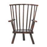 A rare George III stained ash child's primitive Windsor armchair, West Country, circa 1800 The