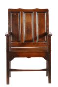 An interesting William & Mary oak triple-panelled 'loving' armchair, circa 1690  Of broad design,