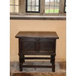 A rare James I oak box-top table, Dorset, circa 1620 Having a hinged twin-boarded top with ovolo-