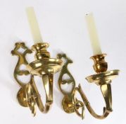 A pair of cast brass wall sconces, 18th century and later Each with a shaped and pierced backplate