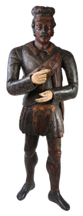 A rare early 19th life-size carved and polychrome-decorated tobacconists figure, modelled as a