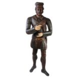 A rare early 19th life-size carved and polychrome-decorated tobacconists figure, modelled as a