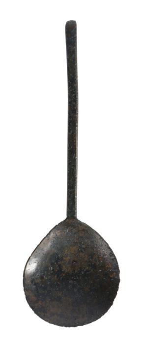 A 17th century latten slip-top spoon, English  Having flattened-hexagonal stem, indistinct maker's