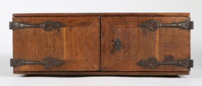 A late 17th century oak table-top document cabinet, Flemish Of boarded and flush-panelled