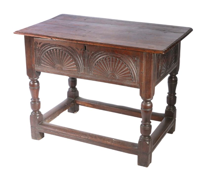 An Elizabeth I oak box-top table, circa 1600 Having a boarded hinged top with ovolo-moulded edge, - Image 2 of 4