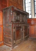 A small Charles I oak court cupboard, West Country, probably Dorset, circa 1630 With typical thin