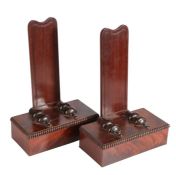 A pair of 19th century mahogany plate/salver stands, in the manner of Gillows, English Each having a