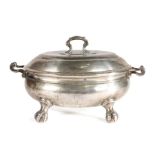 An early George III pewter lidded soup tureen, circa 1760 Of oval form, with some Rococo features