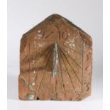 An early 18th century sandstone sundial, dated 1710 Of rectangular pediment form, with pierced metal