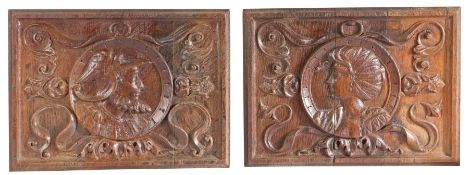 A pair of carved oak Romayne-type panels One carved with a male bust, the other female, each