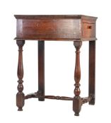 An unusual William & Mary oak side table, circa 1700 Tall, having a boarded top with linear