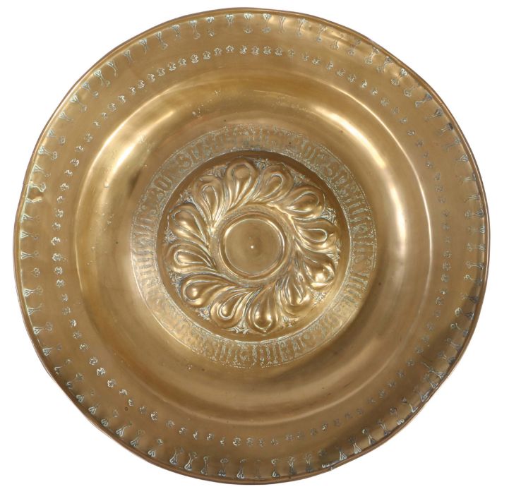 A mid-16th century brass alms dish, Nuremberg, circa 1550 The central boss of twelve double-